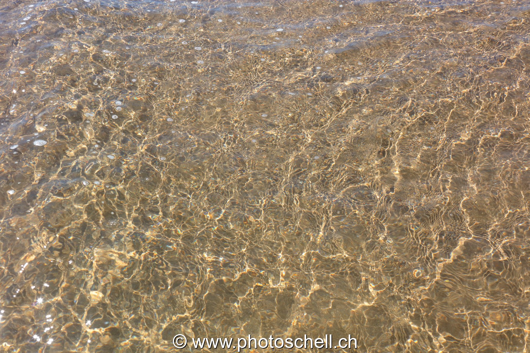 Reflets sur le sable