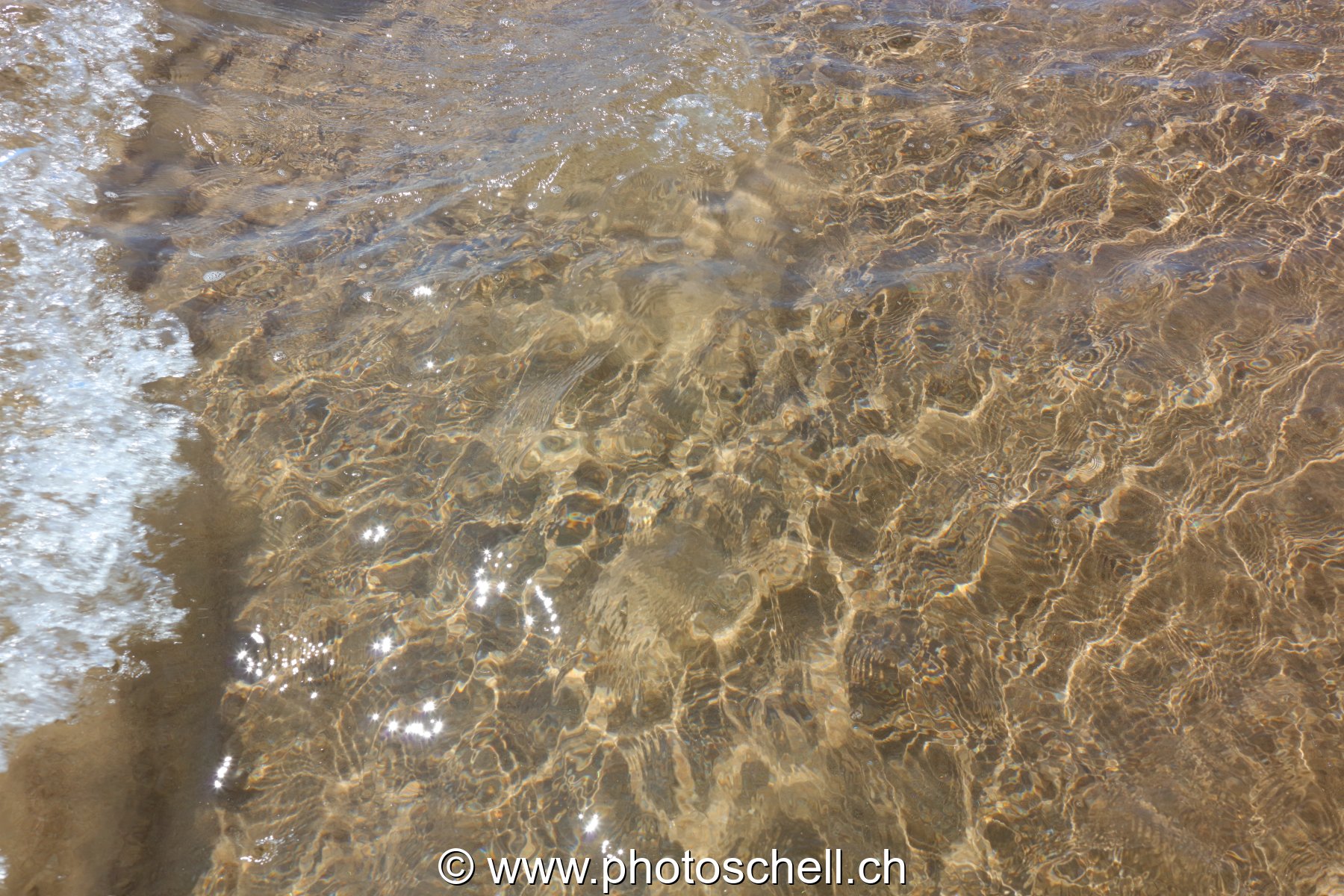 Reflets sur le sable