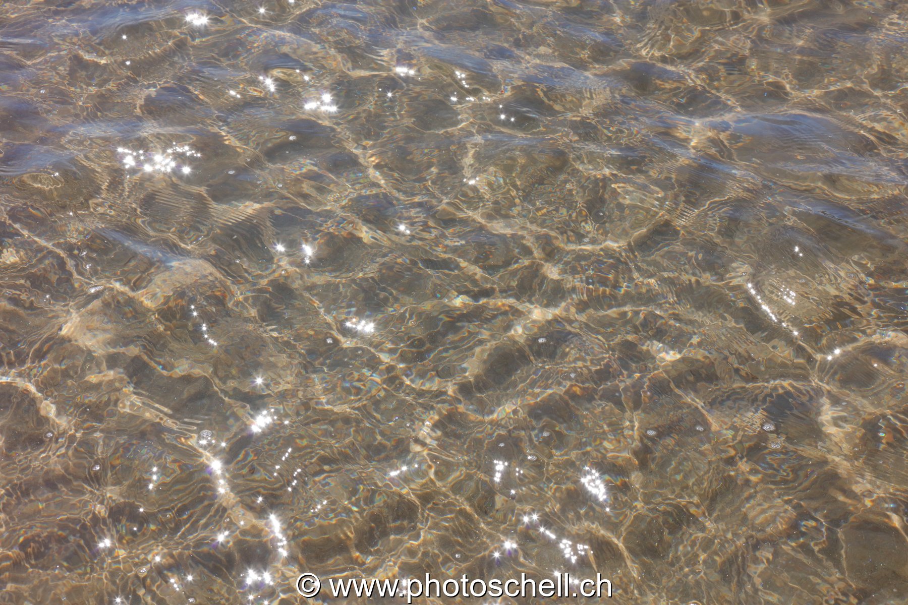 Reflets sur le sable
