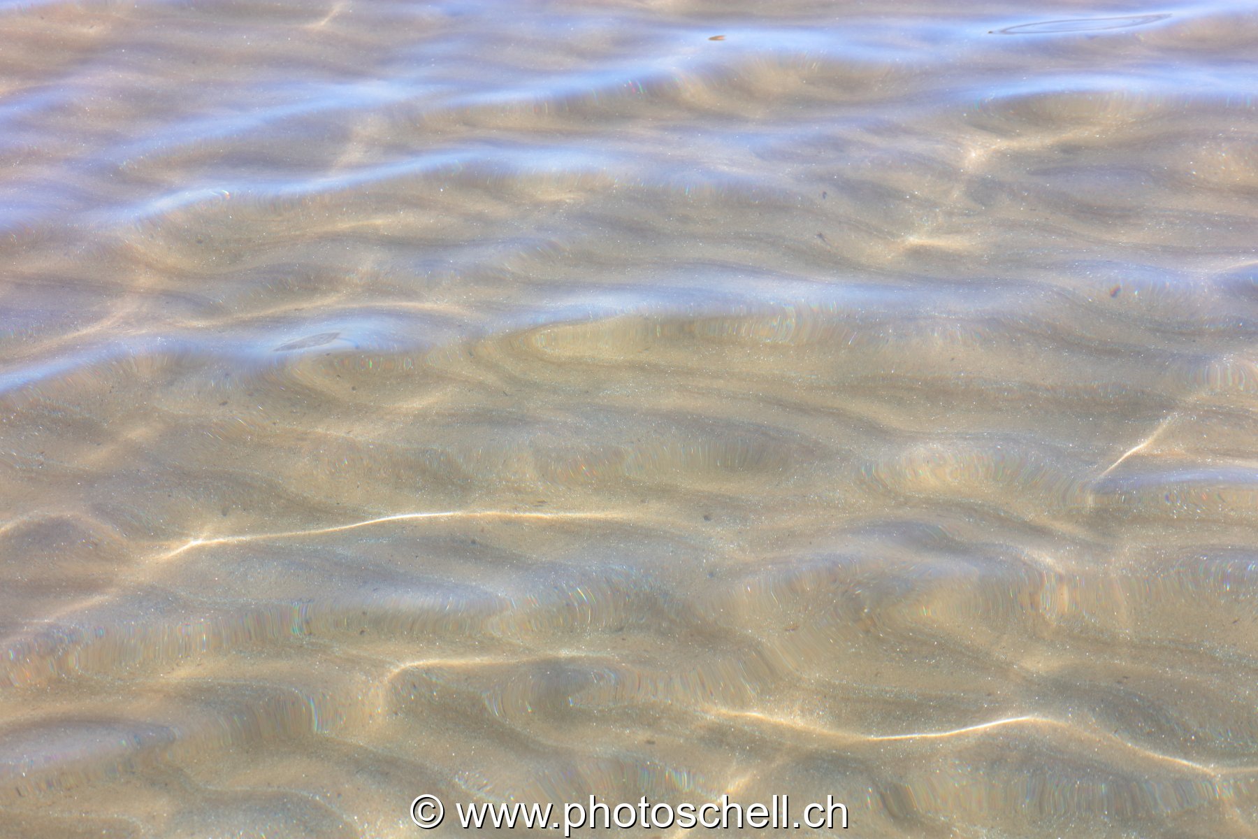 Reflets sur le sable