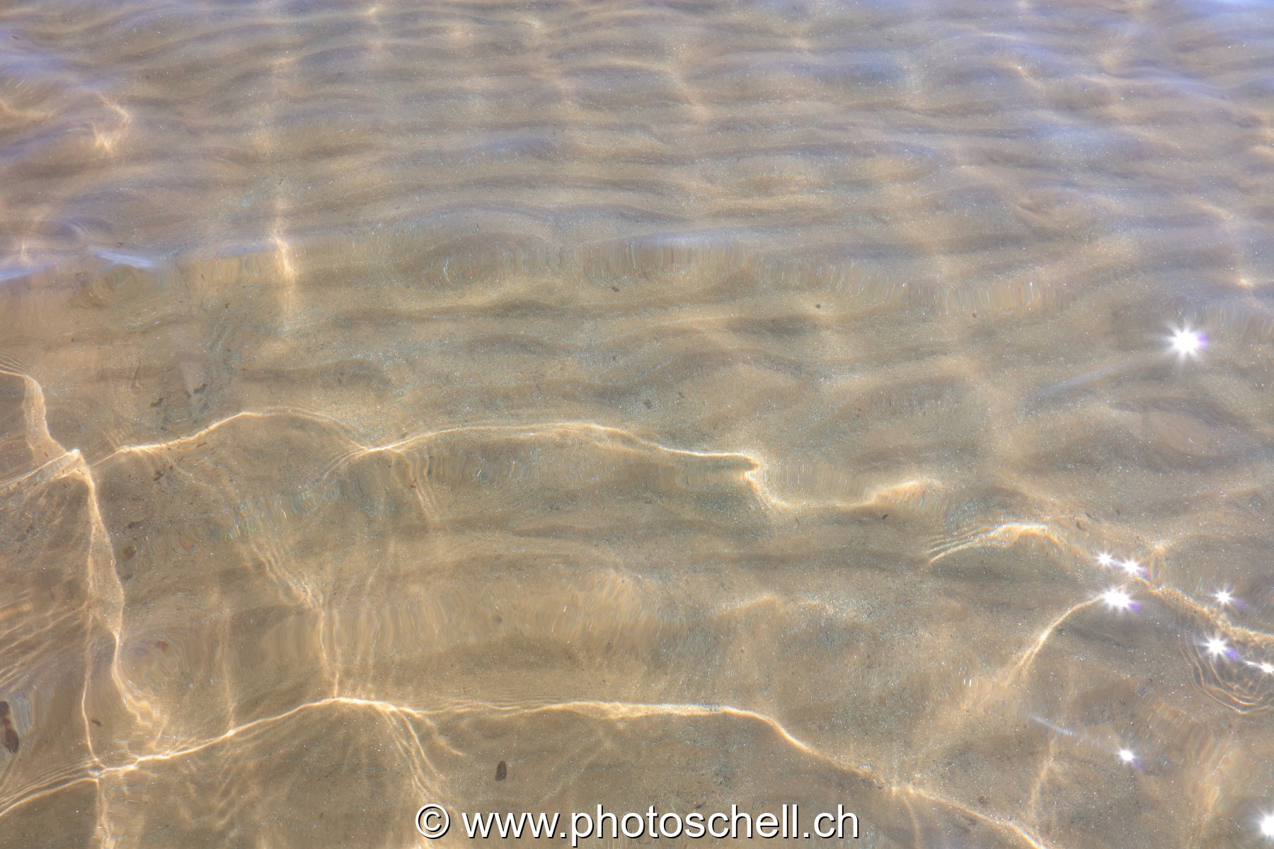 Reflets sur le sable