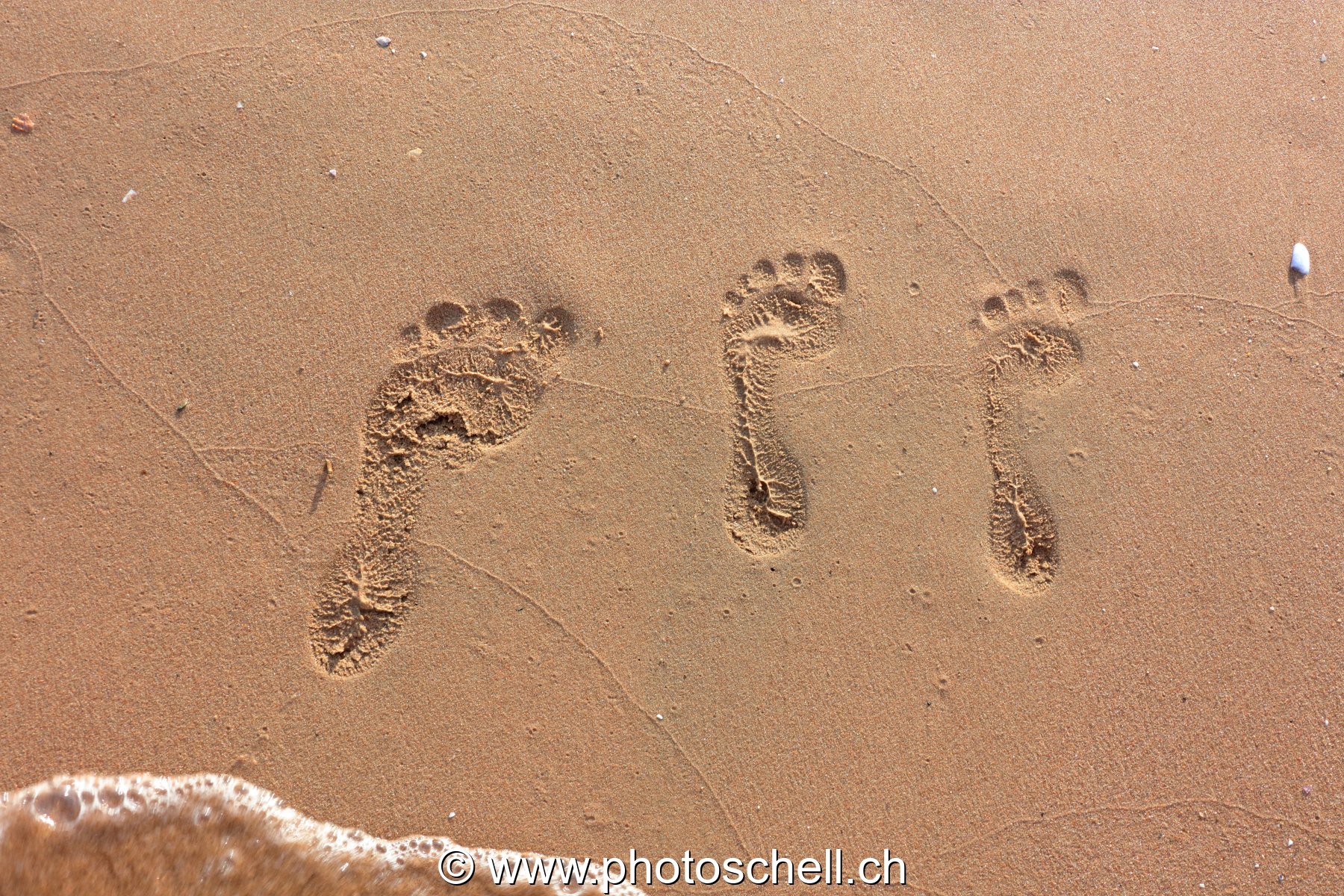 Empreintes de pas dans le sable