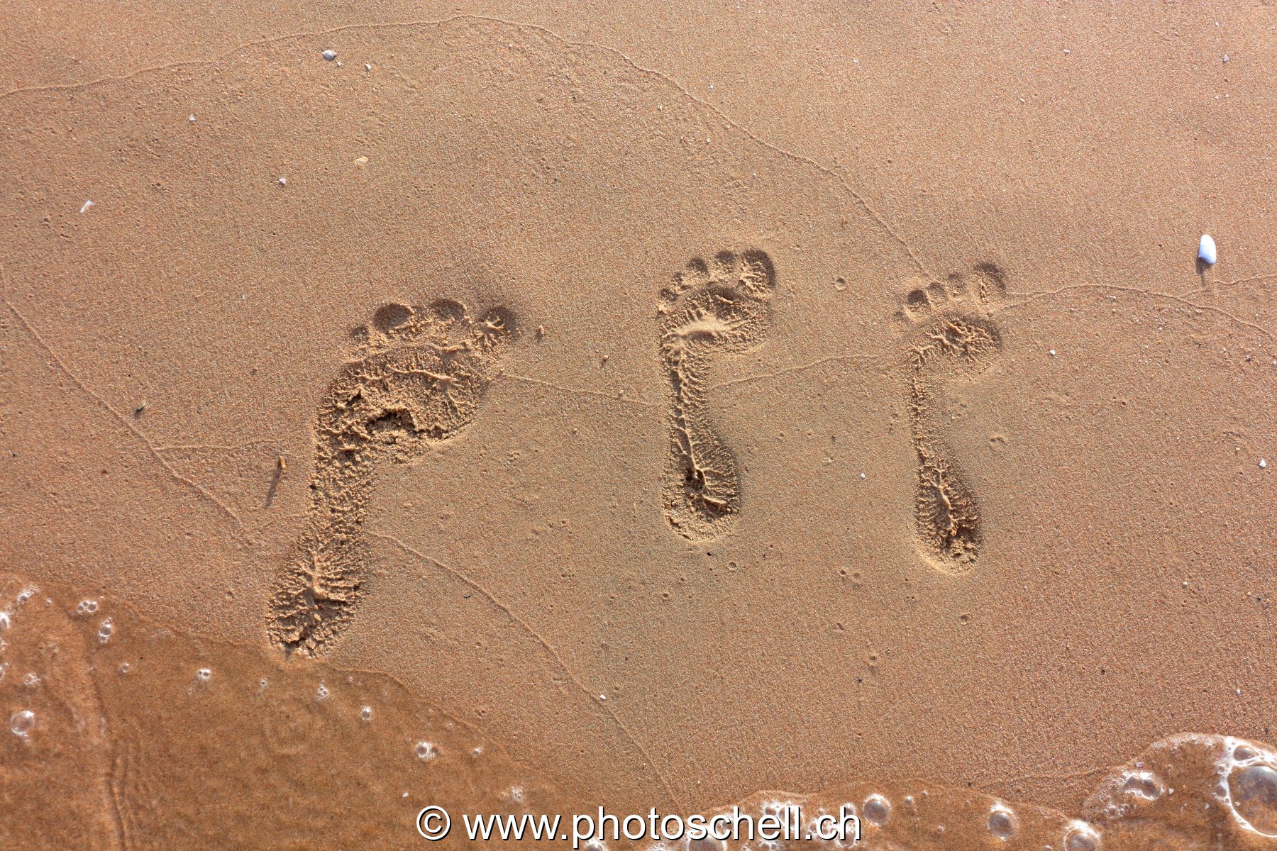 Empreintes de pas dans le sable
