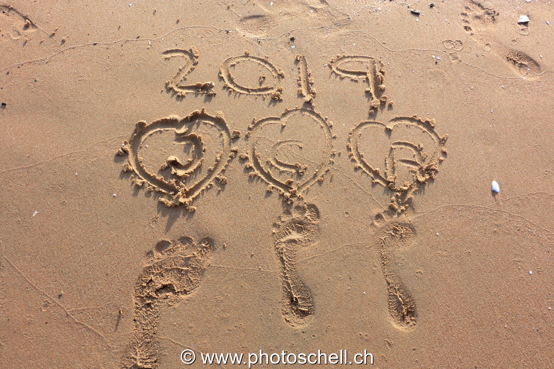 Empreintes de pas dans le sable