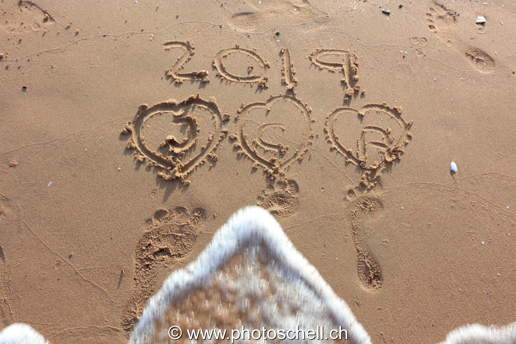 Empreintes de pas dans le sable