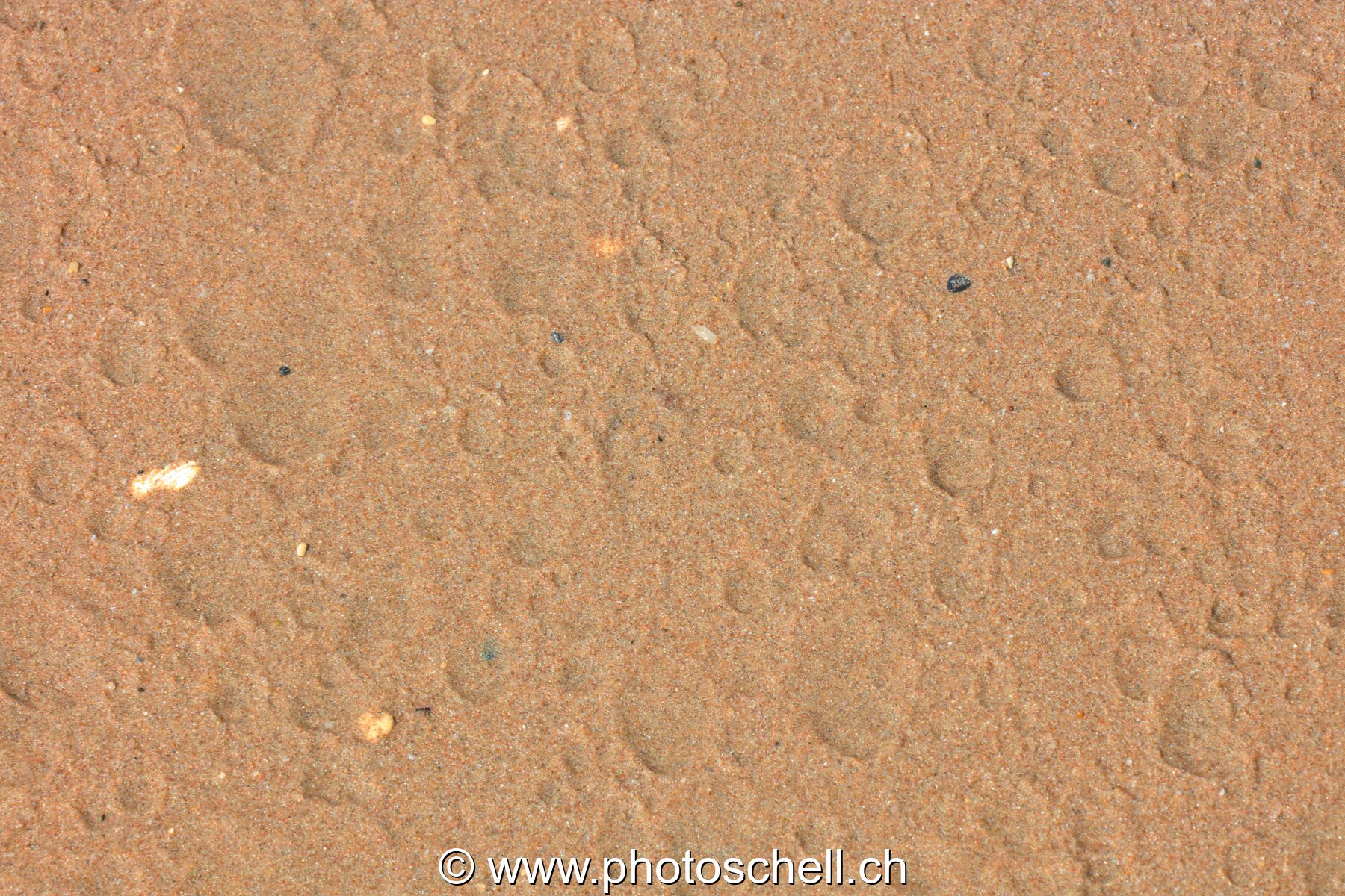 Impact d'eau sur le sable
